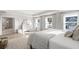 Spacious main bedroom with bright windows, stylish furniture, and an en-suite bath at 606 Dunswell Dr, Summerville, SC 29486