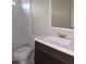 Bathroom featuring a toilet, vanity with sink and faucet, and a shower and bathtub with white tiling at 620 Coral Acres Dr, Moncks Corner, SC 29461