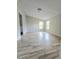 Bright and open bedroom with stylish floors, neutral walls, and ample natural light at 620 Coral Acres Dr, Moncks Corner, SC 29461