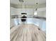 A clean kitchen featuring all white cabinets and new flooring at 620 Coral Acres Dr, Moncks Corner, SC 29461