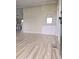 An entryway that features modern flooring, white walls, and a built in cabinet at 620 Coral Acres Dr, Moncks Corner, SC 29461