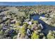 Stunning aerial view of houses, a lake, marshland and water in a tree-filled landscape at 739 Stiles Dr, Charleston, SC 29412