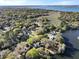 Panoramic aerial view of homes surrounded by trees, waterways, and marshland in a coastal area at 739 Stiles Dr, Charleston, SC 29412