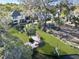 Stunning backyard featuring a private dock, lush landscaping, mature trees and well-maintained lawn at 739 Stiles Dr, Charleston, SC 29412