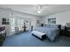A charming bedroom with a sitting area by a bay window, ceiling fan, and comfortable furnishings at 739 Stiles Dr, Charleston, SC 29412