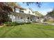 Charming two-story traditional home with a welcoming front porch and beautifully landscaped yard at 739 Stiles Dr, Charleston, SC 29412