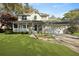 Charming two-story traditional home with a welcoming front porch and beautifully landscaped yard at 739 Stiles Dr, Charleston, SC 29412