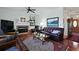 Cozy living room with fireplace, built-in shelves, and hardwood floors at 739 Stiles Dr, Charleston, SC 29412