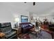Comfortable living room featuring hardwood floors and a stylish leather sofa at 739 Stiles Dr, Charleston, SC 29412