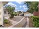 View of the backyard that features a detached garage and a well maintained driveway at 798 Rutledge Ave, Charleston, SC 29403