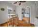 Cozy breakfast nook with seating and a ceiling fan near the bright kitchen at 798 Rutledge Ave, Charleston, SC 29403
