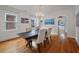 Traditional dining room with hardwood floors, chandelier, and an adjacent butler's pantry at 798 Rutledge Ave, Charleston, SC 29403