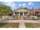 Charming home featuring a picket fence and inviting front porch at 798 Rutledge Ave, Charleston, SC 29403