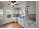 Bright kitchen with white cabinets, stainless steel appliances, and granite countertops at 798 Rutledge Ave, Charleston, SC 29403