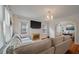 Spacious living room featuring hardwood floors, fireplace, and open layout at 798 Rutledge Ave, Charleston, SC 29403