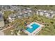 Aerial view of resort-style property with swimming pool and well-manicured landscaping at 9000 Palmetto Dr # 202-C, Isle of Palms, SC 29451