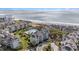 A coastal community offers a serene lifestyle with beach access and lush landscaping at 9000 Palmetto Dr # 202-C, Isle of Palms, SC 29451