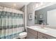 Bathroom with shower-tub combo, updated sink and vanity, and bright lighting at 9000 Palmetto Dr # 202-C, Isle of Palms, SC 29451