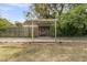 Charming backyard retreat featuring a pergola with seating, perfect for outdoor relaxation at 939 Mikell Dr, Charleston, SC 29412