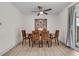 Bright dining room with seating for six and modern light fixture at 939 Mikell Dr, Charleston, SC 29412