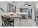 Spacious kitchen with gray cabinets, butcher block countertops, a kitchen island, and stainless steel appliances at 939 Mikell Dr, Charleston, SC 29412