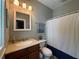 Bathroom featuring a vanity with great lighting and a shower-tub combo at 1002 Blockade Runner Ct, Charleston, SC 29414