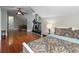 Attic bedroom featuring hardwood floors, natural light, and a private seating area at 1002 Blockade Runner Ct, Charleston, SC 29414