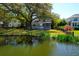 Charming home with a lush backyard, pond, and a picturesque view at 1006 Wayfarer Ln, Charleston, SC 29412