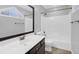 Bathroom featuring a white vanity with a large mirror and a shower with a tub at 1006 Wayfarer Ln, Charleston, SC 29412