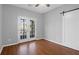 Bedroom features French doors with transom windows and modern barn door at 1006 Wayfarer Ln, Charleston, SC 29412