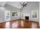 Bright living room with hardwood floors, fireplace, vaulted ceilings, and ample natural light at 1006 Wayfarer Ln, Charleston, SC 29412