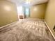 Spacious bedroom with carpet flooring and access to an ensuite bathroom at 1009 Highland Pines Rd, Ladson, SC 29456