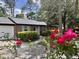 Charming brick home with a well-manicured front yard and inviting entrance at 1009 Highland Pines Rd, Ladson, SC 29456