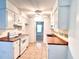 Kitchen featuring white appliances, wood countertops and tile flooring at 1009 Highland Pines Rd, Ladson, SC 29456