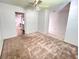 Cozy living room featuring carpet floors and access to other parts of the house at 1009 Highland Pines Rd, Ladson, SC 29456