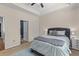 Comfortable bedroom showcasing a king-size bed, ceiling fan, and ensuite bathroom at 102 Vango Dr, Goose Creek, SC 29445