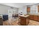 Dining area and kitchen featuring stainless steel appliances, countertops, and a kitchen island with seating at 102 Vango Dr, Goose Creek, SC 29445