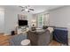 Cozy living room with a large sofa and entertainment center at 102 Vango Dr, Goose Creek, SC 29445