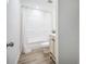 Compact bathroom featuring a tub, toilet, vanity, and simple, clean design at 103 Bush Dr, Bonneau, SC 29431
