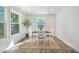 Cozy dining room with natural light, a modern table set, and stylish decor at 103 Bush Dr, Bonneau, SC 29431