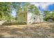 Side view of a single-story home featuring neutral siding, showcasing its compact and efficient design at 103 Bush Dr, Bonneau, SC 29431