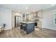 Well-appointed kitchen with stainless steel appliances, large island, and modern finishes at 103 Bush Dr, Bonneau, SC 29431