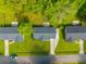 Aerial view of a neighborhood highlighting well-maintained lawns and rooflines on a sunny day at 1104 Margaret Dr, Ladson, SC 29456