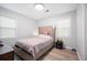 Cozy bedroom with a upholstered headboard and natural light at 1104 Margaret Dr, Ladson, SC 29456