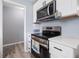Bright kitchen featuring stainless steel appliances and white cabinets at 1104 Margaret Dr, Ladson, SC 29456