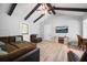 Well lit living room with wood floors and connected dining area at 1104 Margaret Dr, Ladson, SC 29456