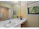 Bathroom featuring a standard vanity and view to outdoors at 113 High Hammock Villas, Seabrook Island, SC 29455