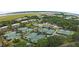 Community featuring multiple tennis courts, surrounded by trees and well-maintained landscaping at 113 High Hammock Villas, Seabrook Island, SC 29455