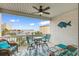 Charming balcony with ocean views, comfortable seating, and stylish decor, perfect for relaxing and entertaining at 114 W Arctic Ave # B302, Folly Beach, SC 29439