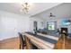 Bright dining area offering seamless transition to the living room with fireplace at 1209 River Rock Rd, Hanahan, SC 29410